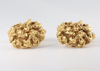 A pair of yellow metal 18ct 'nugget' cufflinks, 19.3 grams 17mm by 13mm