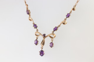 A 9ct yellow gold amethyst pendant on a 9ct yellow gold 36cm chain, 4.6 grams  