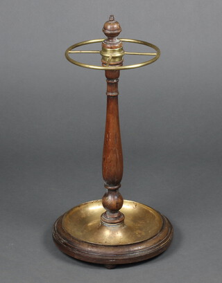 An Edwardian turned mahogany and gilt metal umbrella/stick stand 64cm h x 32cm diam. 