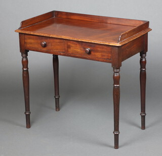 A Victorian mahogany wash stand with raised 3/4 gallery, fitted 2 drawers with turned handles, raised on turned supports 78cm h x 84cm w x 47cm d 