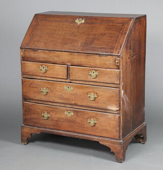 A 17th/18th Century oak bureau, the fall front fitted a well above 2 short and 2 long drawers with replacement brass swan neck drop handles, 109cm x 90cm w x 51cm d 