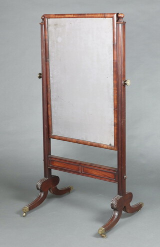 A 19th Century rectangular plate cheval mirror contained in a mahogany swing frame, the base with brass caps and casters 167cm h x 82cm w x 65cm 
