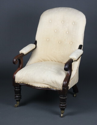 A William IV mahogany open arm chair upholstered in white buttoned material, raised on turned supports 102cm h x 67cm w x 52cm d (seat 30cm x 32cm) 
