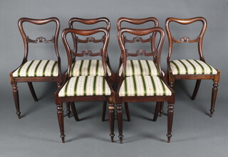 A set of 6 Victorian carved rosewood spoon back dining chairs with carved mid rails and drop in seats, raised on turned supports 83cm h x 46cm w x 42cm d (seats 29cm x 29cm) 