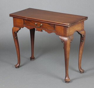 A Georgian rectangular mahogany tea/card table fitted a drawer, raised on cabriole supports 73cm h x 90cm w x 39cm d 