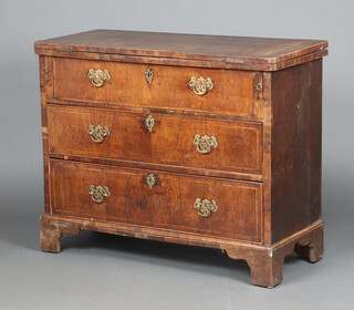 A Queen Anne style walnut bachelor's chest of 3 drawers with replacement handles, feather banded top, raised on bracket feet 76cm h x 95cm w x 41cm d (possibly made up) 