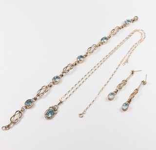A 9ct yellow gold topaz set bracelet 18cm, a ditto pendant on chain 46cm, a bar brooch and a pair of earrings 17.9 grams