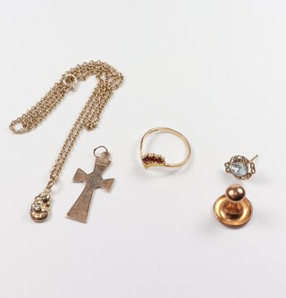 A 9ct yellow gold cross pendant, a chain with diamond set pendant, ring, stud and ear stud, 9.2 grams 
