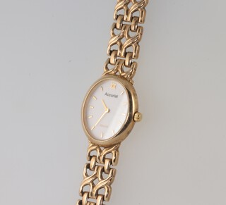A lady's 9ct yellow gold Accurist wristwatch, with 2 spare links, 17.7 grams gross 