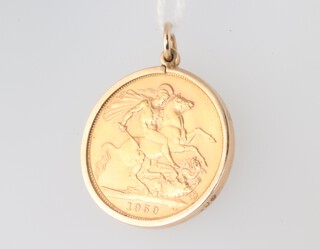 A sovereign 1959, in a 0.7 gram 9ct mount 