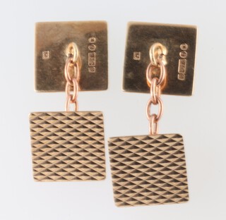A pair of 9ct yellow gold engine turned cufflinks 5.8 grams 