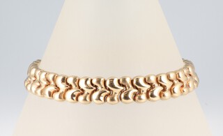 A yellow metal 9ct flat link bracelet, 23.5cm, 19.9 grams 