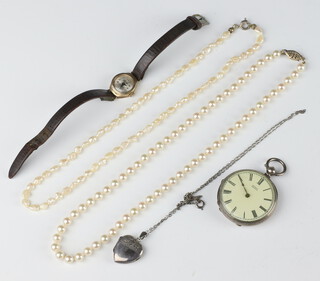 A lady's silver key wind fob watch, a lady's 9ct gold cased wristwatch on a leather strap, 2 imitation pearl necklaces, a silver locket and chain  