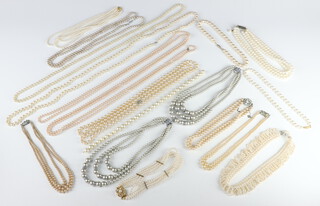 A quantity of imitation pearl necklaces 