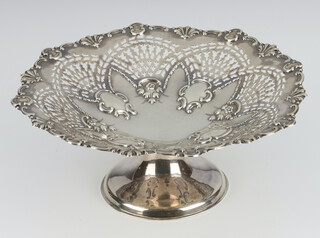 An Edwardian repousse and pierced silver tazza decorated with flowers Birmingham 1900 22cm, maker Charles Horner ? 275 grams 
