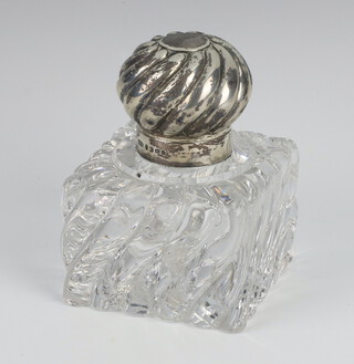 A Victorian moulded glass silver mounted inkwell, rubbed marks 10cm 