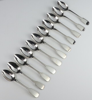 Eleven Victorian silver Old English pattern dessert spoons Dublin 1863 and 1865, maker JS, 261 grams 
