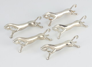 Five silver plated knife rests in the form of horses 