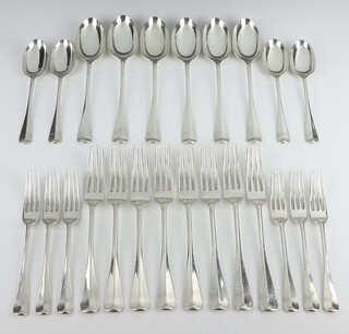 A set of Edwardian silver cutlery comprising 8 dessert forks, 8 dinner forks, 4 dessert spoons, 6 table spoons, London 1908, maker Robert Stebbings 1534 grams