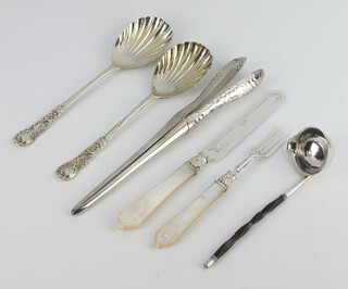 A pair of Edwardian hammered pattern silver glove stretchers, 2 serving spoons, a knife, fork and ladle, weighable silver 189 grams gross 
