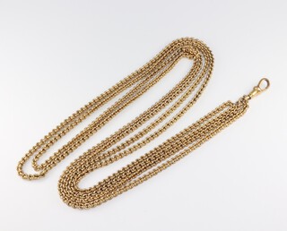 A yellow metal muff chain with clasp, 146cm,  61 grams 