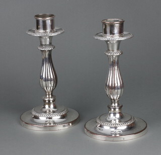A pair of impressive silver plated baluster candle holders 27cm 