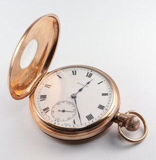 A 9ct yellow gold half hunter mechanical pocket watch the case numbered 246257, the dial and movement inscribed State with seconds at 6 o'clock, contained in a 50mm case, Birmingham 1922  