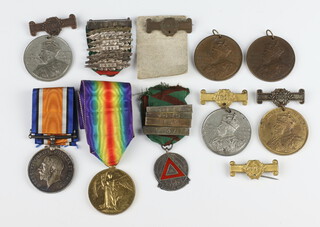 A World War One pair of medals to 172652 GNR.W.J.Maynard.R.A, together with school attendance medals and Safe Driving medallions 