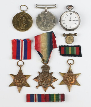 An Edwardian silver fob watch together with a First World War Victory medal and 1914 Star to 4719 Pte.E.L.Cook 16/LRS, together with 2 Second World War medals 