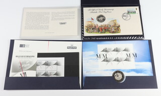 A silver commemorative coin 200th Running of The Derby 1979 and a 2000 commemorative five pound coin and stamps 