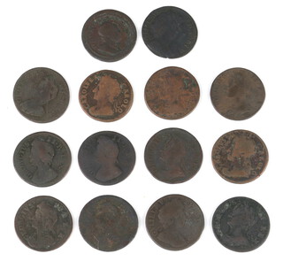 A collection of British farthings coins including Charles II, William and Mary, George I and George II 