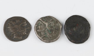 Three ancient Greek coins, two silver Hemidrachms, total weight 4.6 grams, together with a bronze coin  