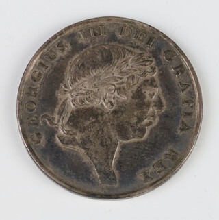 A British Sterling silver bank token of George III and an 18 pence token dated 1816, 7.8 grams 