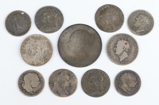 A collection of British Sterling coins: 1 half crown, silver shillings and sixpences, pre 1902, 46.25 grams 