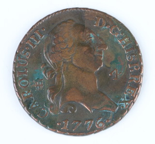 A Spanish copper coin of Charles III, dated 1776 with a value of 4 Maravedis 