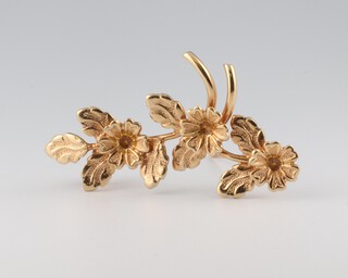 A yellow metal floral brooch, 45mm