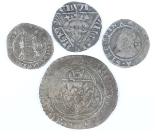 Four European hammered silver coins of the 16th Century, 3 French and 1 Spanish 