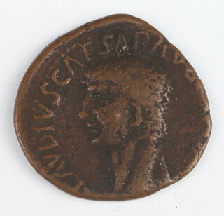 A brass dupondius coin for Claudius, 41-54AD, minted in Gaul 