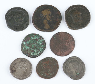 A collection of dupondius and other Roman coins dating from 100AD to 300AD 