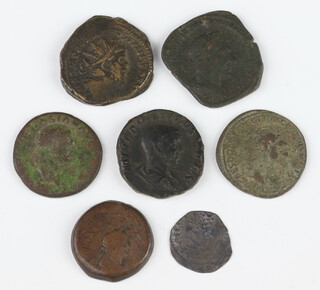 A collection of dupondius and other Roman coins dating from 100AD to 300AD 