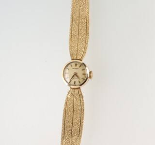 A lady's 18ct yellow gold Rolex wristwatch on a ditto bracelet 33.6 grams gross, the case 15mm, 