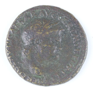 A Roman brass Sestertius of Nero Lugdunum 65AD, the reverse shows Ceres seated and holding ears of corn, Annona is standing and holding a cornucopia 