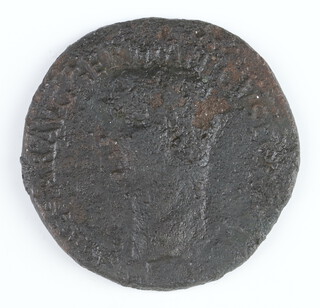 A Roman copper As crown for Caligula 37-41AD, the Emperor is shown bareheaded, the reverse shows Vesta seated, holding a patter and a sceptre 