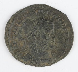 A Roman copper As coin for Maximises 235-38AD, the reverse shows Hercules 