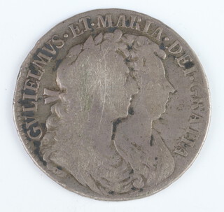 A silver half crown of William and Mary, 1689, first busts, first crowned shield 