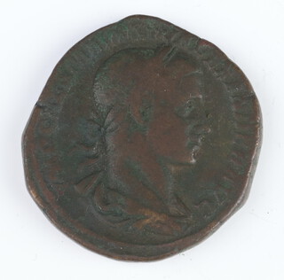 A brass sestertius of of Severus Alexander (222-35AD), the reverse shows Mars carrying a spear and an eagle trophy