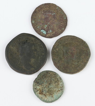 A group of brass or bronze Roman coins from the second and third centuries AD