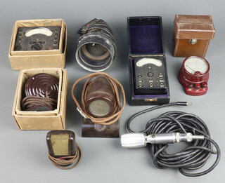 A Second World War Air Ministry reflector gun site mark no.2713/43, an Avo Minor meter boxed, a Western Electrical instrument AC voltmeter in a red Bakelite case, a Robbin microphone and 3 others 