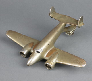 A chrome car mascot in the form of a 2 engined jet aircraft 19cm x 26cm 