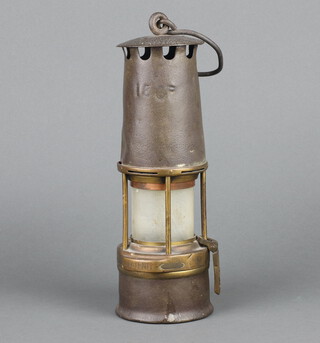 A miner's safety lamp marked Patent 136F 